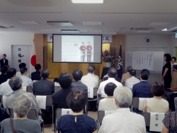 写真:表彰者の職場での活動報告