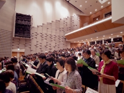 写真:民生委員信条を朗読する委員の皆様
