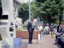 写真：吉井審議官による講演