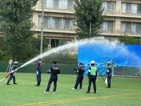 写真[1]：消防操法大会の様子
