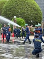 写真[1]：消防操法大会の様子